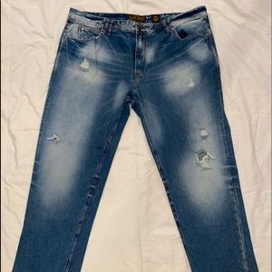 MEN’S AKOO BRAND STRAIGHT MED WASH DISTRESSED